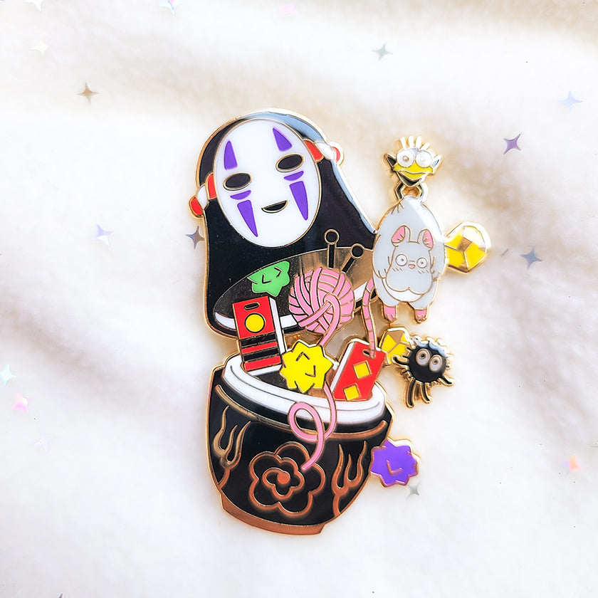 NO FACE NESTING DOLL ENAMEL PIN